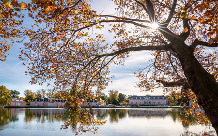 DUSSELDORF, GERMANY - OCTOBER 19, 2022: Panoramic image of Benrath castle during autumn against blue sky on October 19, 2022 in Dusseldorf, Germanyのeditorial素材