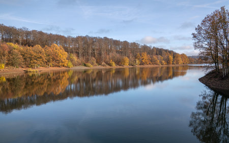 Panoramic image of Lingese lake close to Marienheide in evening light during autumn, Bergisches Land, Germanyの写真素材