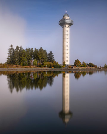 Heather tower near Willingen with reflection and cloudy sky, Sauerland, Germanyの写真素材