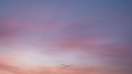 Evening sky with pastel-colored cloudsの写真素材