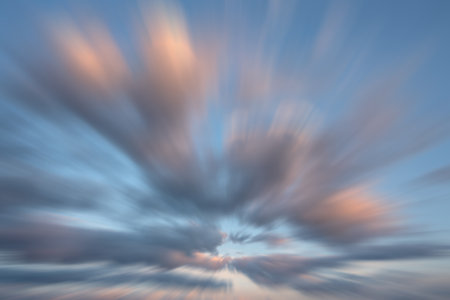 Evening sky with pastel-colored cloudsの写真素材