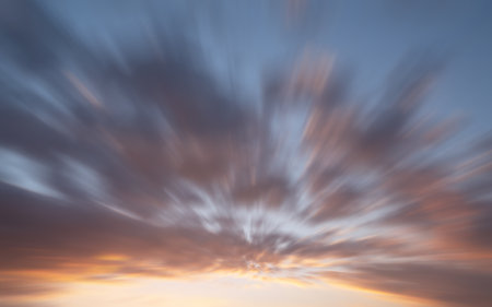 Evening sky with pastel-colored cloudsの写真素材