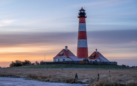Panoramic image of Westerhever lighthouse against sky, North Frisia, Germanyの写真素材