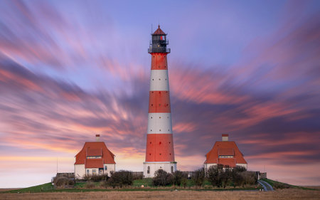 Panoramic image of Westerhever lighthouse against sky, North Frisia, Germanyの写真素材