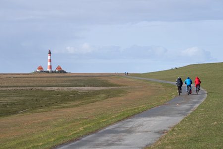 Panoramic image of Westerhever lighthouse against sky, North Frisia, Germanyの写真素材