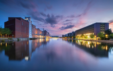 DUISBURG, GERMANY - AUGUST 12, 2023: Panoramic image of historical city harbor of Duisburg during evening light on August 12, 2023 in Germanyのeditorial素材