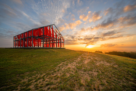 Neukirchen-Vlyn, Germany - July 26, 2025: Norddeutschland tip, landmark of Ruhr Metropolis against sunrise on July 26, 2025 in Neukirchen-Vlyn, Germanyのeditorial素材