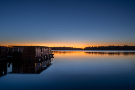 Neuruppin, Germany - October 18, 2025: Panoramic image of morning mood on the Ruppin Lake on October 18, 2025 in Neuruppin, Brandenburg, Germanyの写真素材