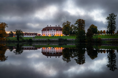 Gransee, Germany - October 13, 2025: Panoramic image of Meseberg castle with water reflection on October 13, 2025 in Gransee, Brandenburg, Germanyのeditorial素材
