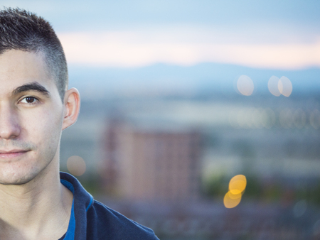 half face man with city in the backgroundの写真素材