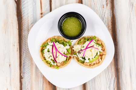 Mexican dish, crab sopes with green sauce