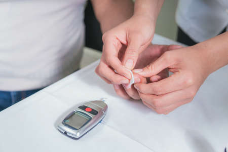 closeup of tool for measuring blood glucose levelsの写真素材