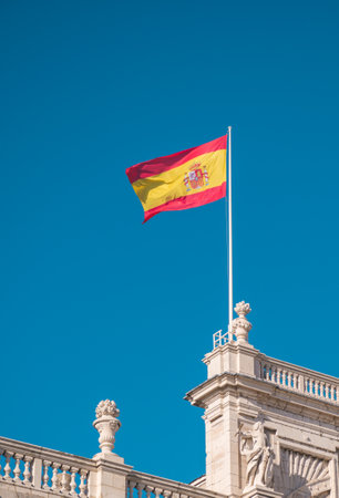 View of the Spanish flag with the sky in the backgroundのeditorial素材