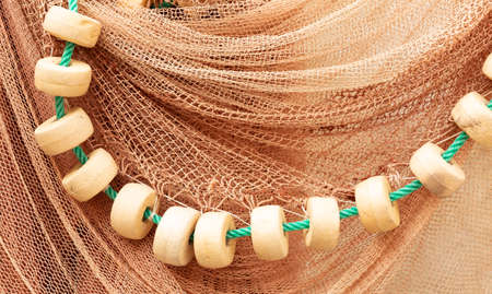 Close-up of a traditional fishing net. Concept of fishing industry.