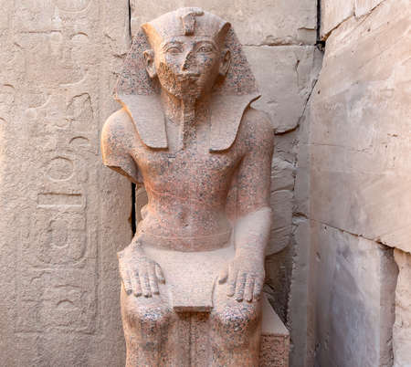 Seated Statue of Pharaoh Thutmose III near the Festival Hall of Thutmose III at The Karnak Temple...
