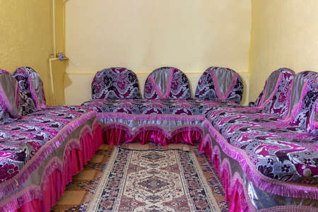 Pink couch in a little roomの写真素材