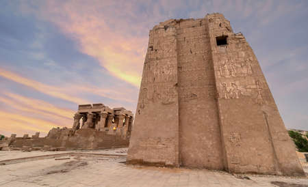 Ruins of the Temple of Kom Ombo in the Nile river at sunset, Egyptの写真素材