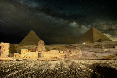 Giza pyramids and Sphinx light up at nightの写真素材