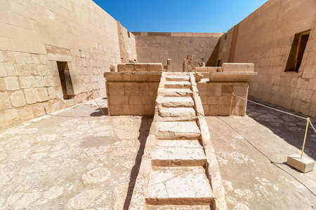 The Mortuary Temple of Hatshepsut, also known as the Djeser-Djeseru. Built for the Eighteenth Dynasty pharaoh Hatshepsut, it is located beneath the cliffs at Deir el-Baharinear the Valley of the Kingsの写真素材