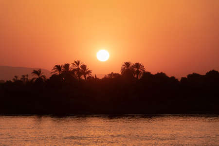 Sunset over the Nile river in Egyptの写真素材