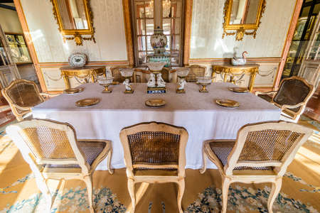 Queluz, Portugal - December 9, 2017: Dinning room in Queluz Royal Palace. Formerly used as the Summer residence by the Portuguese royal family.のeditorial素材