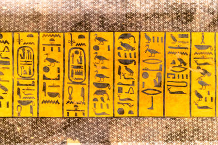 Hieroglyphs on a wall in the Valley of Kings in Luxor, Egypt