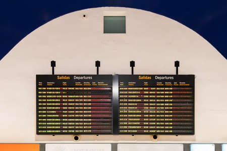 Seville, Spain - March 13,2018: Flight information display system inside the Seville international airportのeditorial素材