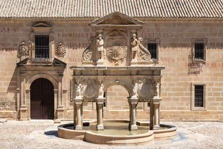 View of the Santa Maria fountain with St Philip Neri Seminary university to the rear, Baeza, Jaen Province, Andalucia, Spain, Western Europeのeditorial素材