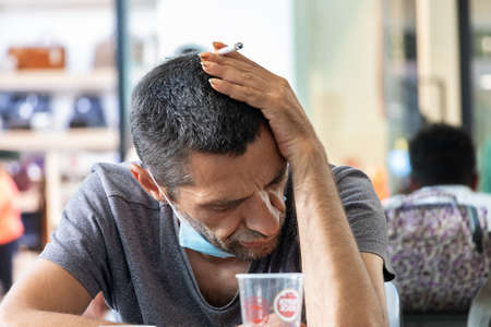 Lagoa, Portugal - July 11, 2020: A couple of women paddle surfing in benagil caves over turquoise watersのeditorial素材