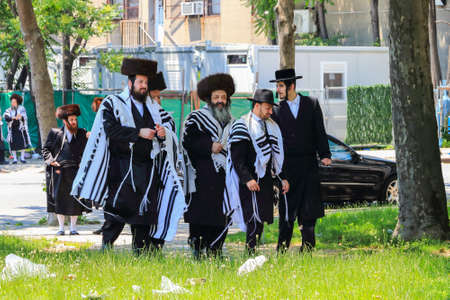 New York City, USA - June 10, 2017: Orthodox Jews Wearing Special Clothes on Shabbat, in Williamsburg, Brooklyn, New Yorkのeditorial素材