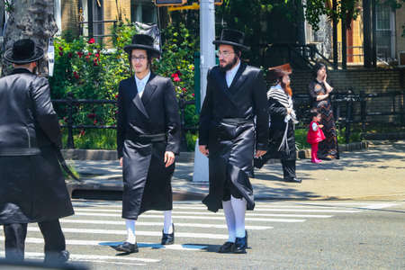New York City, USA - June 10, 2017: Orthodox Jews Wearing Special Clothes on Shabbat, in Williamsburg, Brooklyn, New Yorkのeditorial素材