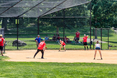 New York City, USA - June 7, 2017: Unidentified people plays amateur baseball in Central Park.のeditorial素材