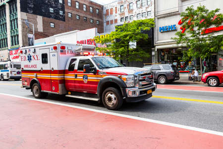 New York City, USA - June 10, 2017: FDNY Ambulance in Harlem. FDNY is the largest combined Fire and EMS provider in the worldのeditorial素材