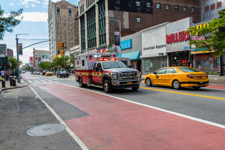 New York City, USA - June 10, 2017: FDNY Ambulance in Harlem. FDNY is the largest combined Fire and...
