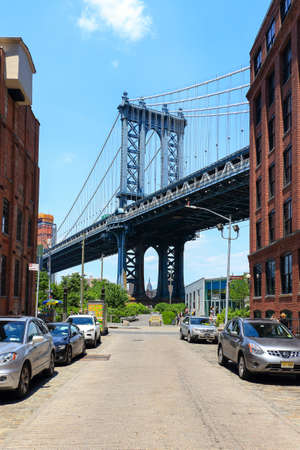New York City, USA - June 10, 2017: Pillar of Manhattan Bridge as seen from Dumbo district in...