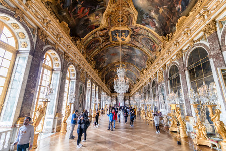 Versailles, France - March 14, 2018: The Hall of Mirrors (Galerie des Glaces) of the Royal Palace of Versailles in France with visitorsのeditorial素材