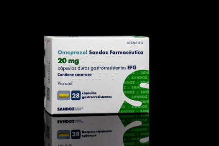 Huelva, Spain - November 26, 2020: Spanish box of Omeprazole brand Sandoz. Omeprazole is used to treat certain stomach and esophagus problems (such as acid reflux, ulcers). It relieves heartburnのeditorial素材