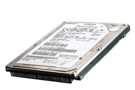 Huelva, Spain - March 16, 2021: An old an used Hitachi Travelstar SATA Hard Disk Drive, size 2.5 "for laptopのeditorial素材