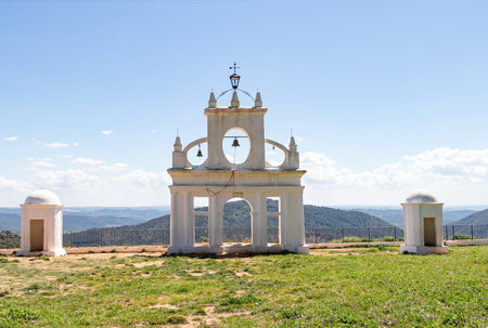 White arch of Steeple and sentry boxes in the interpretation center of the peÃ±a de arias montano in Alajar, Huelva, Spainの写真素材