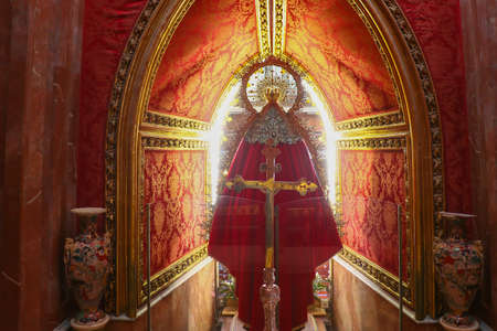 Chipiona, Cadiz, Spain - June 13, 2021: Dressing room of the Virgin of Our Lady of Regla de Chipiona in Main altar of the Sanctuary, a large Catholic church, built in 1906, with Gothic architectureのeditorial素材