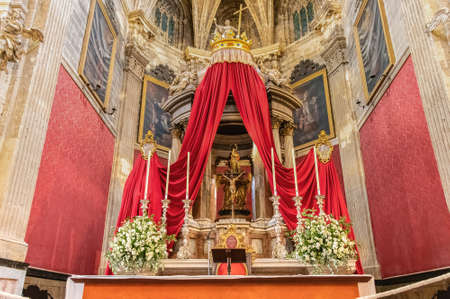 El Puerto de Santa Maria, Cadiz, Spain - June 15, 2021: Main altar and altarpiece inside of Basilica of Our Lady of Miracles in the town of El Puerto de Santa Maria, in Cadiz, Andalucia, Spainのeditorial素材