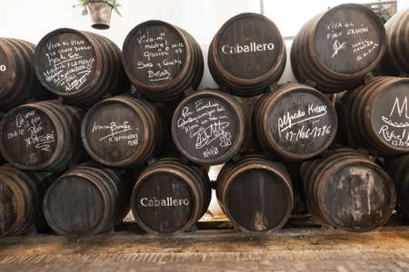 El Puerto de Santa Maria, Cadiz, Spain - June 15, 2021: Exposure of barrels of Caballero in The San Marcos castle. In Wineries "Gonzalez Byass", it's produced the wine Tio Pepe, exported all the worldのeditorial素材
