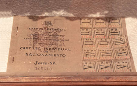 Salamanca, Spain - October 10, 2017: Spanish ration card with coupons valid from 1939 to 1952 during...