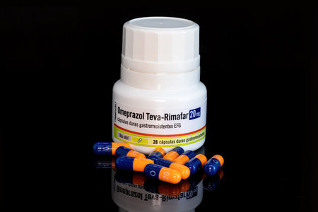Huelva, Spain - August 27, 2021: Spanish bottle of generic Omeprazole from Teva-Rimafar laboratory....