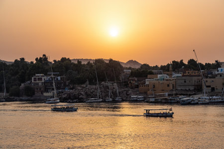 View of a beautiful orange sunset in Aswan, Egyptの写真素材