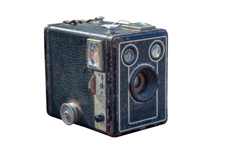 An old photographic camera isolated on white background