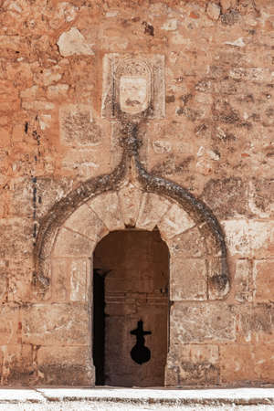 Door on defensive walls of Niebla castle, in Huelva, Andalucia, Spainの写真素材