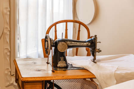 Barcelona, Spain - September 20, 2021: Old sewing machine, model New Family made by Singer. in 1890 sells 90% of the global sewing machine market and is one of the most famous brands in the worldのeditorial素材