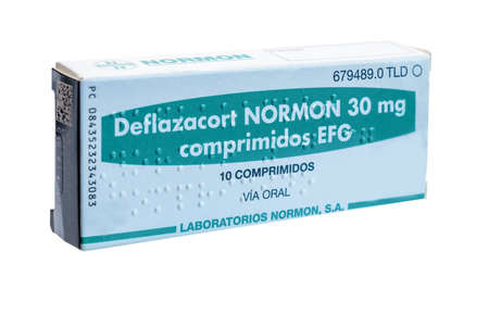Huelva, Spain - October 10, 2021: Spanish box of generic Deflazacort 30mg from Nomon Laboratory. It is a steroid that is used to treat Duchenne muscular dystrophy in adults and children.のeditorial素材