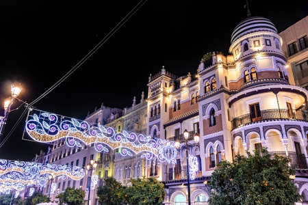 Christmas lights decoration Constitution avenue, Avenida de la ConstituciÃ³n, in Seville, Andalusia, Spainの写真素材
